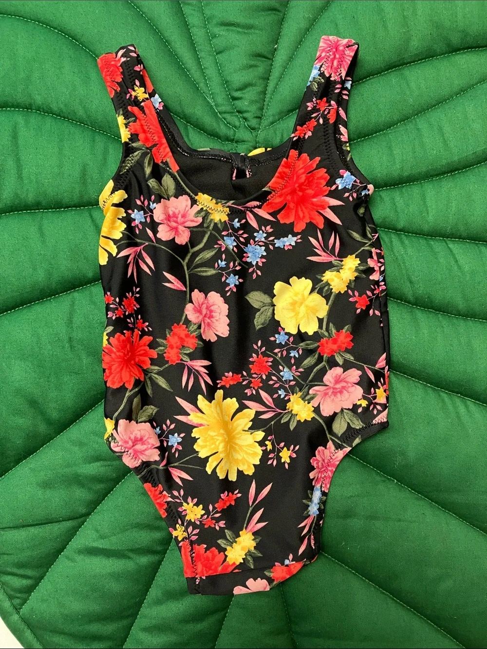 NWOT old navy infant one piece black floral swimsuit. Size 6-12mos